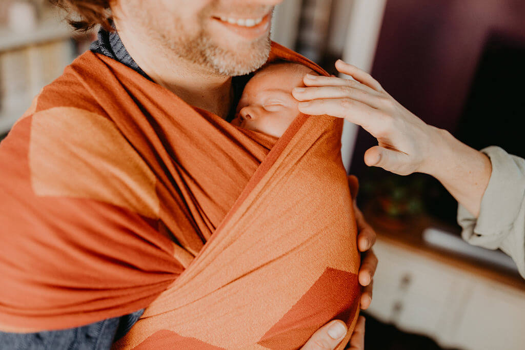 Baby im Tragetuch